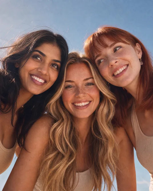 Three Growplex community members with their arms around each other